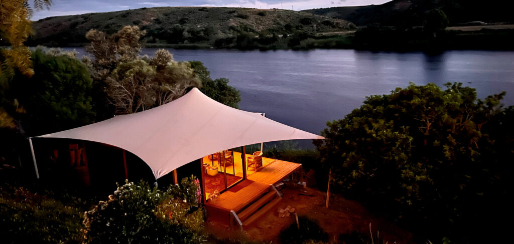 Freeform® Luxury Stretch House on a river